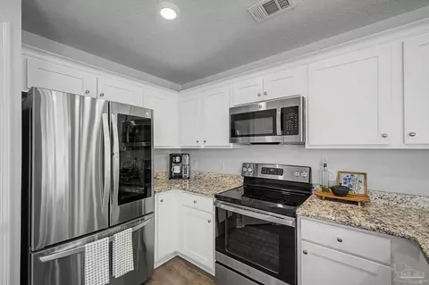 Kitchen - 4042 Floridatown Rd, Pace, FL 32571 photo 3 of 5