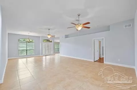 Living - 5202 English Oak Dr, Pace, FL 32571 photo 1 of 2