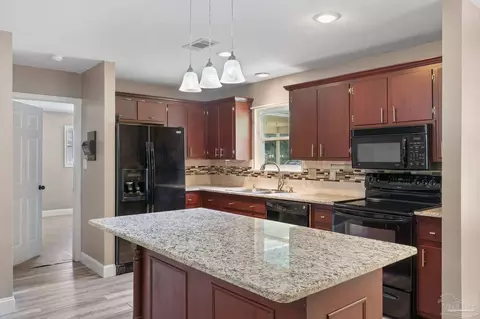 Kitchen - 4188 Marcus Ct, Pace, FL 32571 photo 2 of 3