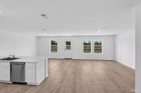 Living - 6481 Buckthorn Cir #HS 12J, Pace, FL 32571 photo 2 of 3