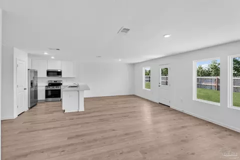 Living - 6481 Buckthorn Cir #HS 12J, Pace, FL 32571 photo 3 of 3