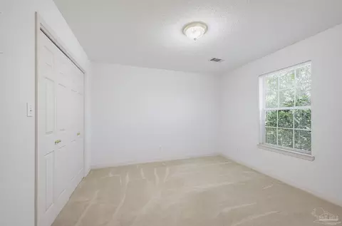 Bedroom - 5647 Tilubo Ln, Pace, FL 32571 photo 4 of 6