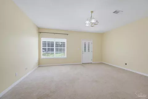 Living - 5647 Tilubo Ln, Pace, FL 32571 photo 2 of 3