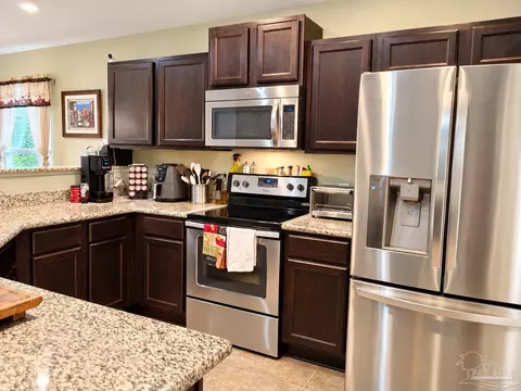 Kitchen - 5491 Peach Dr, Pace, FL 32571 photo 4 of 5