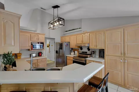 Kitchen - 5615 Whispering Woods Dr, Pace, FL 32571 photo 1 of 7