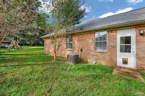 Exterior - 5615 Whispering Woods Dr, Pace, FL 32571 photo 11 of 12