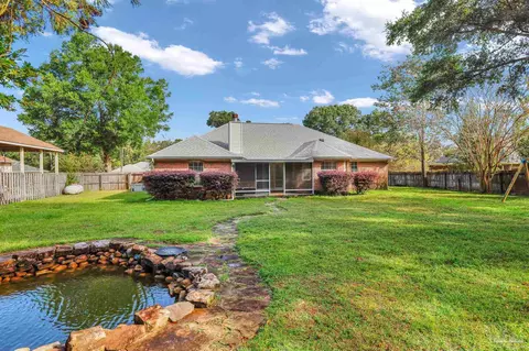 Exterior - 5615 Whispering Woods Dr, Pace, FL 32571 photo 5 of 12