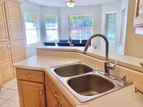 Kitchen - 5615 Whispering Woods Dr, Pace, FL 32571 photo 7 of 7