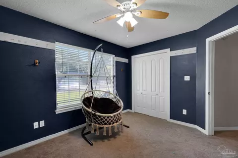 Bedroom - 5615 Whispering Woods Dr, Pace, FL 32571 photo 4 of 4