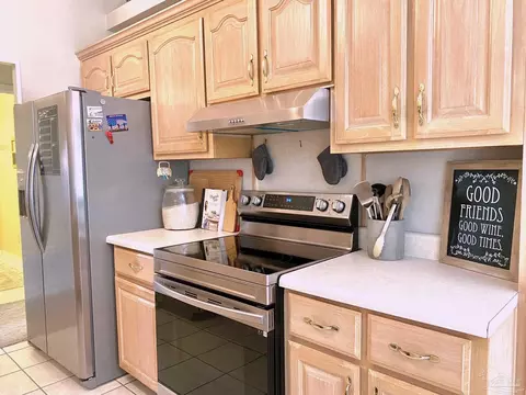 Kitchen - 5615 Whispering Woods Dr, Pace, FL 32571 photo 5 of 7