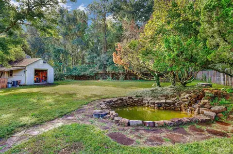 Exterior - 5615 Whispering Woods Dr, Pace, FL 32571 photo 6 of 12