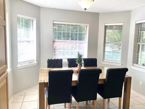 Dining - 5615 Whispering Woods Dr, Pace, FL 32571 photo 2 of 2