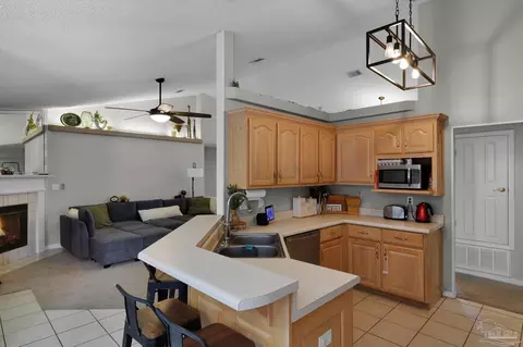 Kitchen - 5615 Whispering Woods Dr, Pace, FL 32571 photo 2 of 7