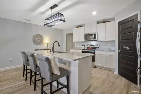 Kitchen - 8664 Tarsus Dr, Milton, FL 32583 photo 3 of 4