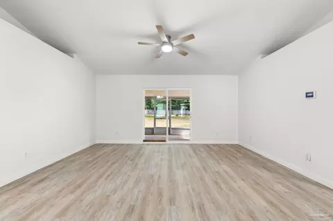 Living - 7448 Rustling Pines Dr, Milton, FL 32583 photo 1 of 6