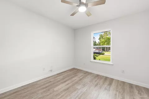 Bedroom - 7448 Rustling Pines Dr, Milton, FL 32583 photo 2 of 3