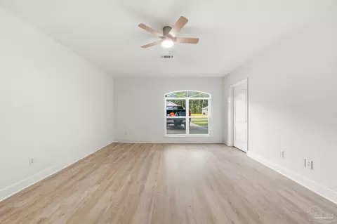 Living - 7448 Rustling Pines Dr, Milton, FL 32583 photo 5 of 6