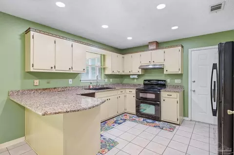 Kitchen - 5737 Bronco Pl, Milton, FL 32570 photo 1 of 2