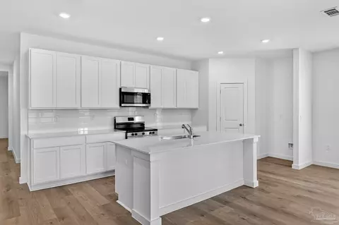 Kitchen - 5979 Serrate St #HS 30J, Pace, FL 32571 photo 2 of 3