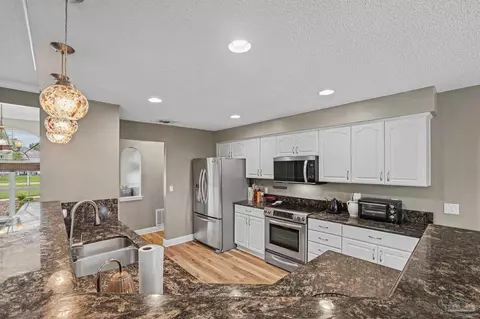 Kitchen - 5637 Firestone Dr, Pace, FL 32571 photo 3 of 5