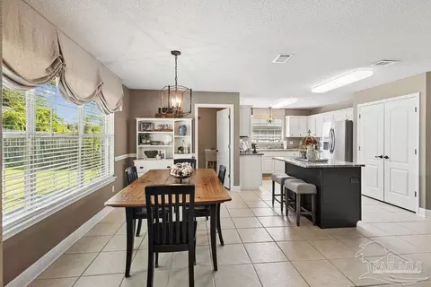 Dining - 4220 Lancaster Gate Dr, Pace, FL 32571 photo 3 of 4