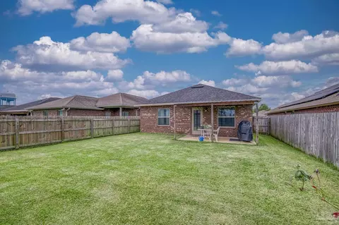 Exterior - 5802 Corkscrew Ct, Pace, FL 32571 photo 7 of 11