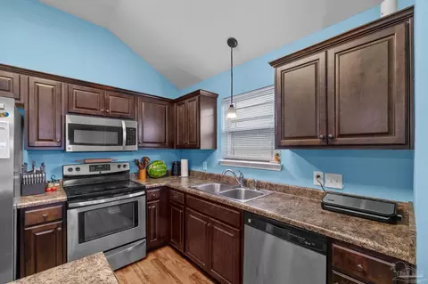 Kitchen - 5802 Corkscrew Ct, Pace, FL 32571 photo 2 of 2