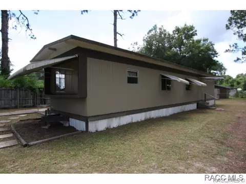 4859 E Bow N Arrow Lp, Inverness, FL 34452 photo 1