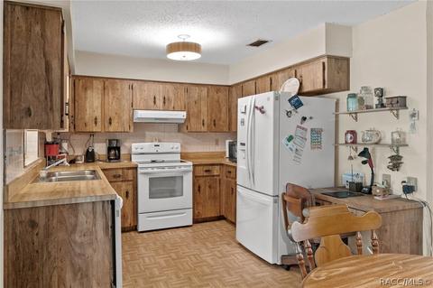8831 E Devonshire Rd, Inverness, FL 34450 photo 9