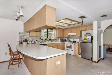 Kitchen - 7500 Delaware Dr, Weeki Wachee, FL 34607 photo 2 of 3