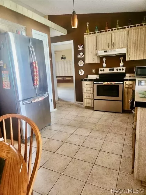 Kitchen - 9744 Eldridge Rd, Spring Hill, FL 34608 photo 5 of 10