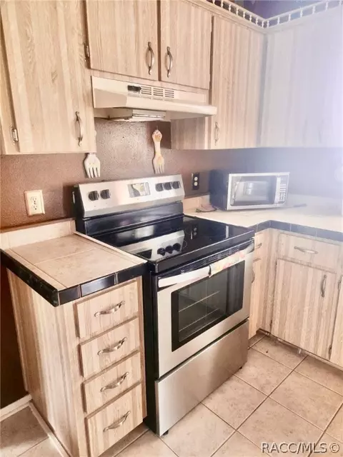 Kitchen - 9744 Eldridge Rd, Spring Hill, FL 34608 photo 7 of 10