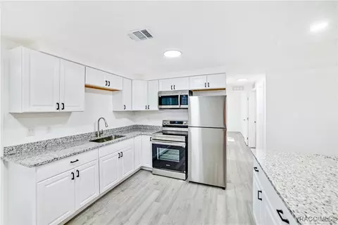 Kitchen - 1474 Coble Rd, Spring Hill, FL 34608 photo 2 of 3