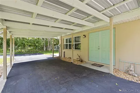 Exterior - 199 Mastadon Dr, Inglis, FL 34449 photo 3 of 14