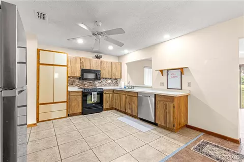 Kitchen - 519 Spring Lake Rd, Ocala, FL 34472 photo 2 of 3