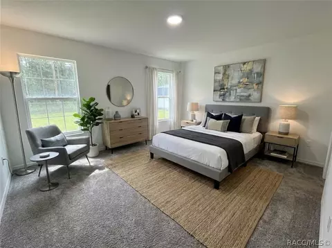 Bedroom - 5990 SE 5th Pl, Ocala, FL 34472 photo 3 of 8