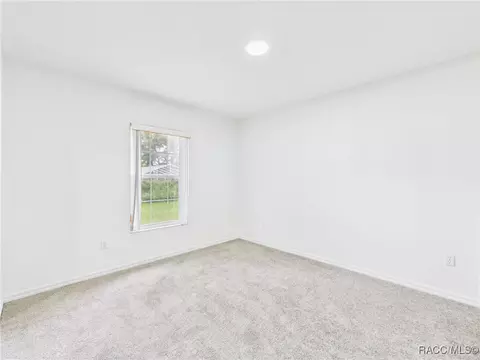 Bedroom - 5990 SE 5th Pl, Ocala, FL 34472 photo 6 of 8