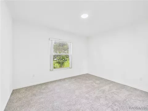 Bedroom - 5990 SE 5th Pl, Ocala, FL 34472 photo 7 of 8