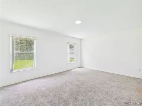 Bedroom - 5990 SE 5th Pl, Ocala, FL 34472 photo 4 of 8