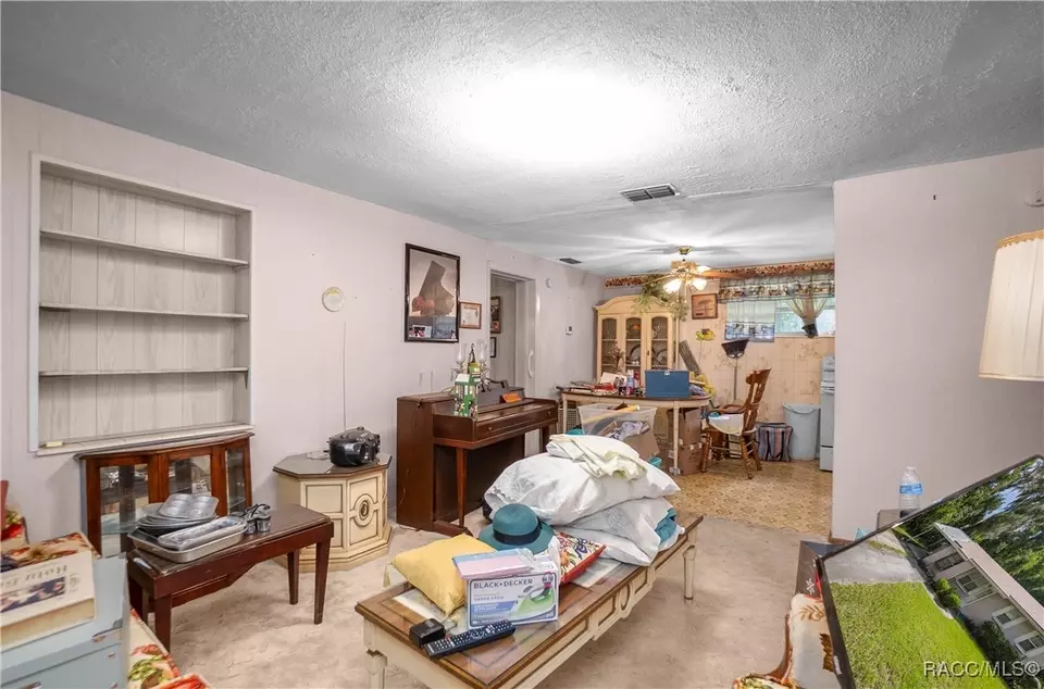 Living - 420 Davidson Ave, Inverness, FL 34450 photo 3 of 5