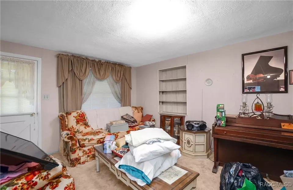 Living - 420 Davidson Ave, Inverness, FL 34450 photo 2 of 5