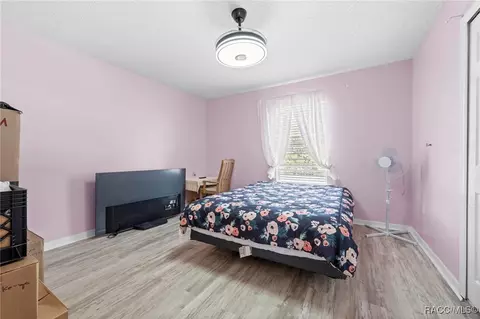 Bedroom - 7319 Lagoon Rd, Spring Hill, FL 34606 photo 7 of 15