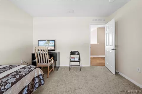 Bedroom - 7319 Lagoon Rd, Spring Hill, FL 34606 photo 10 of 15