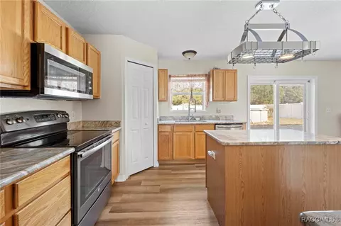 Kitchen - 7319 Lagoon Rd, Spring Hill, FL 34606 photo 3 of 5
