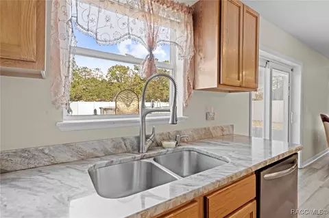 Kitchen - 7319 Lagoon Rd, Spring Hill, FL 34606 photo 2 of 5