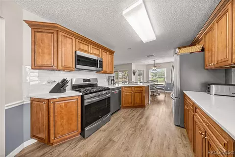 Kitchen - 9482 SW 93rd Loop, Ocala, FL 34481 photo 2 of 3