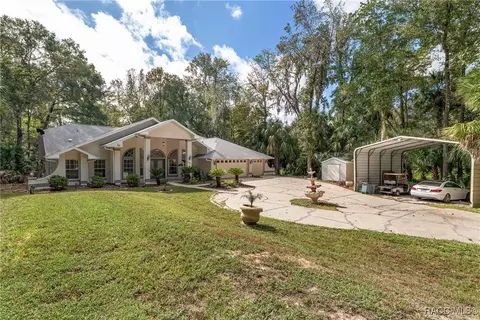 Exterior - 90 Winding River Ln, Inglis, FL 34449 photo 3 of 26