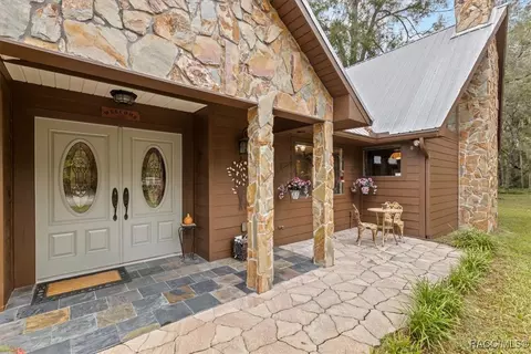 Exterior - 154 SE Hammock Rd, Inglis, FL 34449 photo 3 of 10