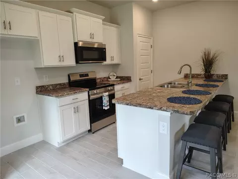 Kitchen - 223 Bittern Loop #TH 46, Inverness, FL 34453 photo 1 of 2