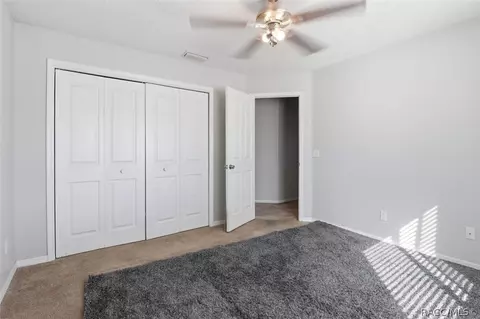 Bedroom - 1131 S Softwind Loop, Lecanto, FL 34461 photo 4 of 5